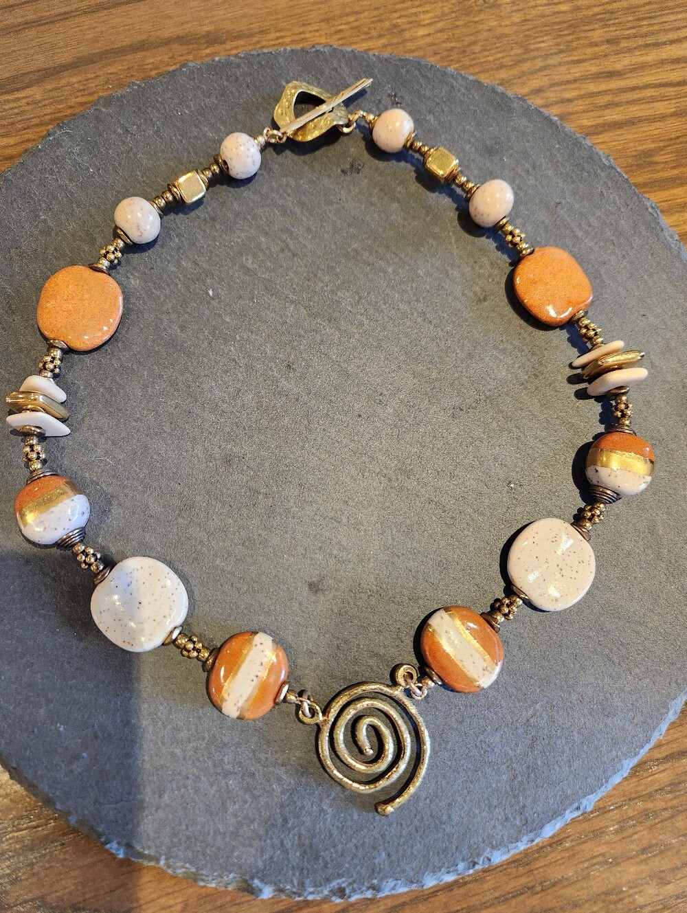 Kazuri Beads With A Metal Cast Pendant and Greek Beads